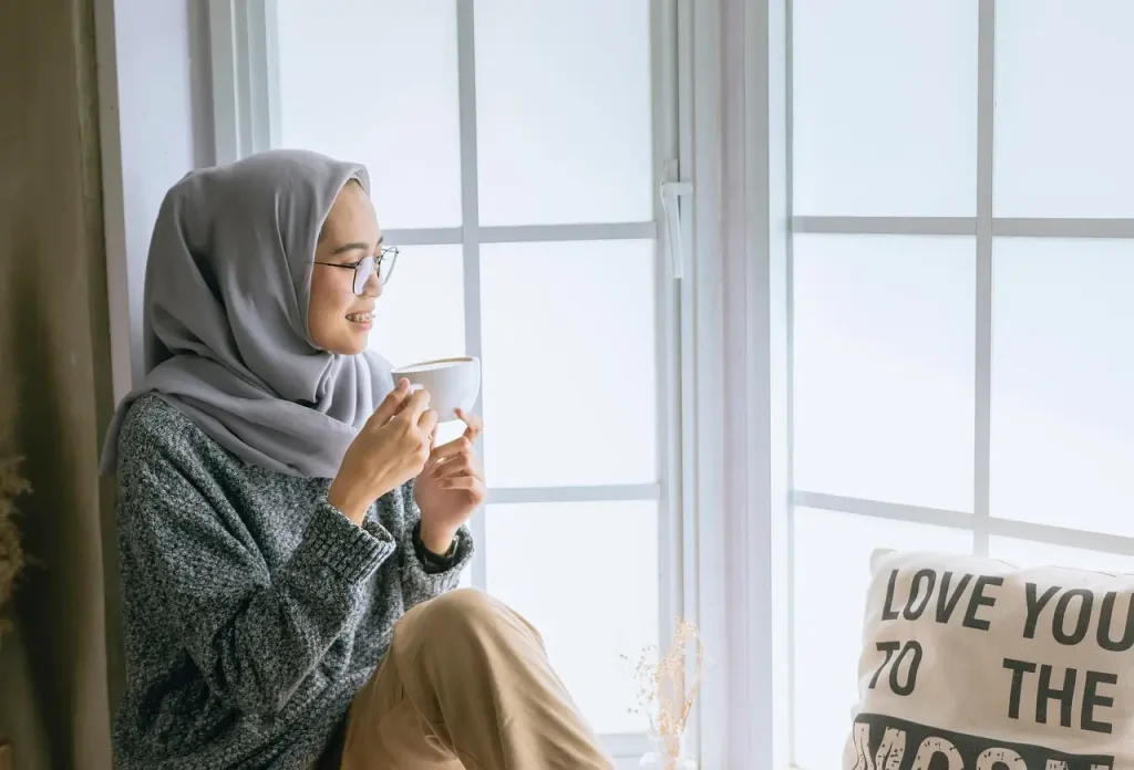 Organized hijab capsule wardrobe with neutral and colorful scarves
