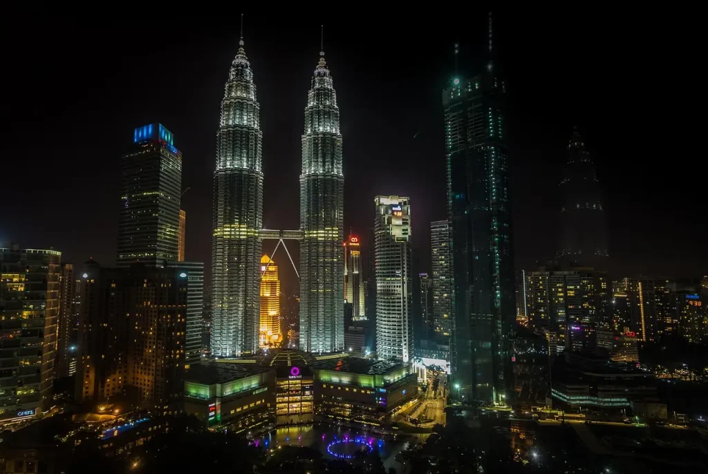 Kuala Lumpur skyline at night with Islamic architecture