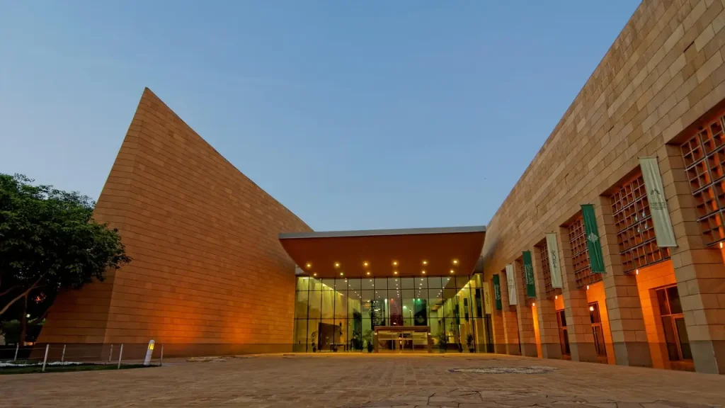 Exterior view of the National Museum in Riyadh, Saudi Arabia, showcasing its modern architecture and cultural significance.”