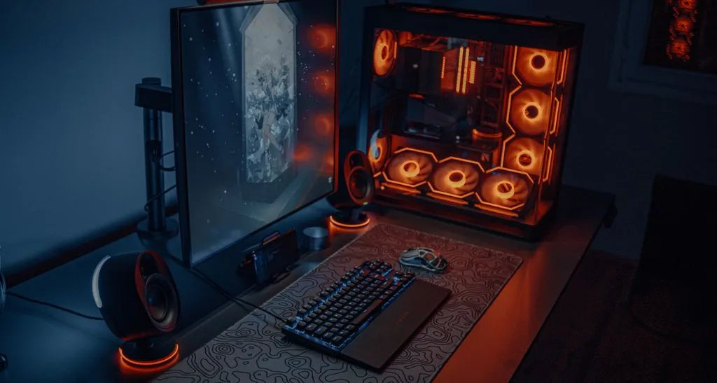 10 Best AI Tools for Productivity in 2026 5 A high-performance hardware setup with an RGB desktop PC and an ultra-wide monitor, showing a workstation optimized to run the best ai tools for productivity in 2026